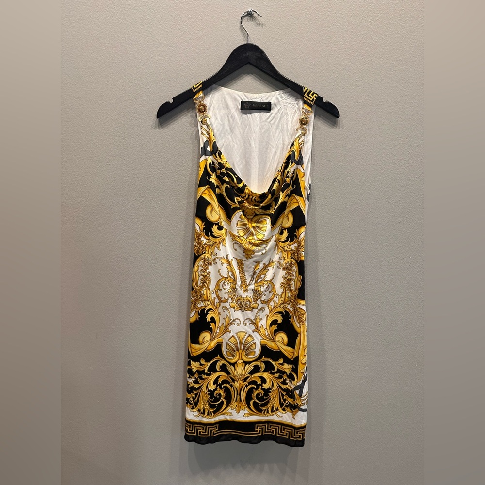 Versace jersey material dress in medium size. Beautiful fit gold Medusa hardware